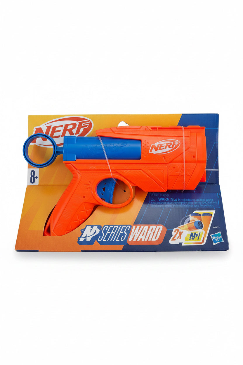 A Nerf Series Ward toy blaster in its original retail packaging, featuring a bright orange body with blue accents and a blue ring, photographed on a woven gray surface.